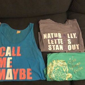 Three Alpha Gamma Delta America Apparel shirts